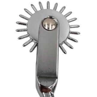 Closeup of a wartenberg wheel, looks similar to a spur.
